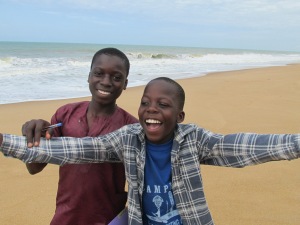 Simeon (right) and a friend seeing the ocean for the first time